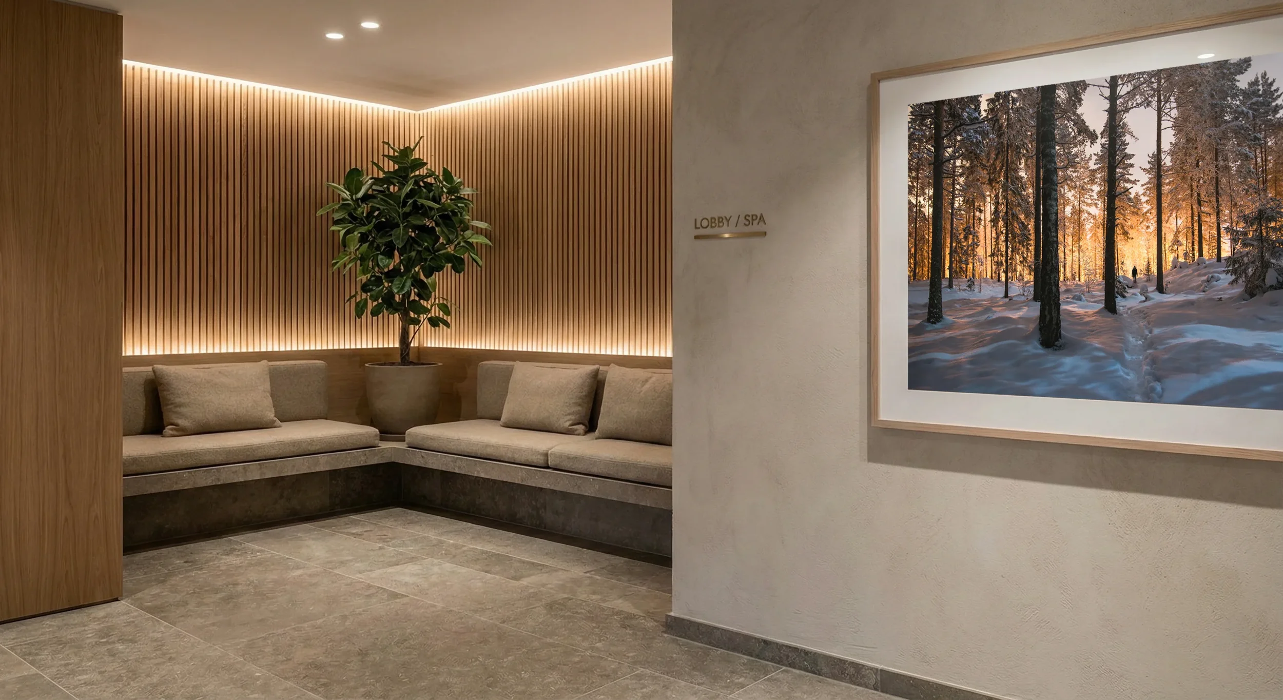 Large atmospheric landscape photograph installed in a refined lobby interior