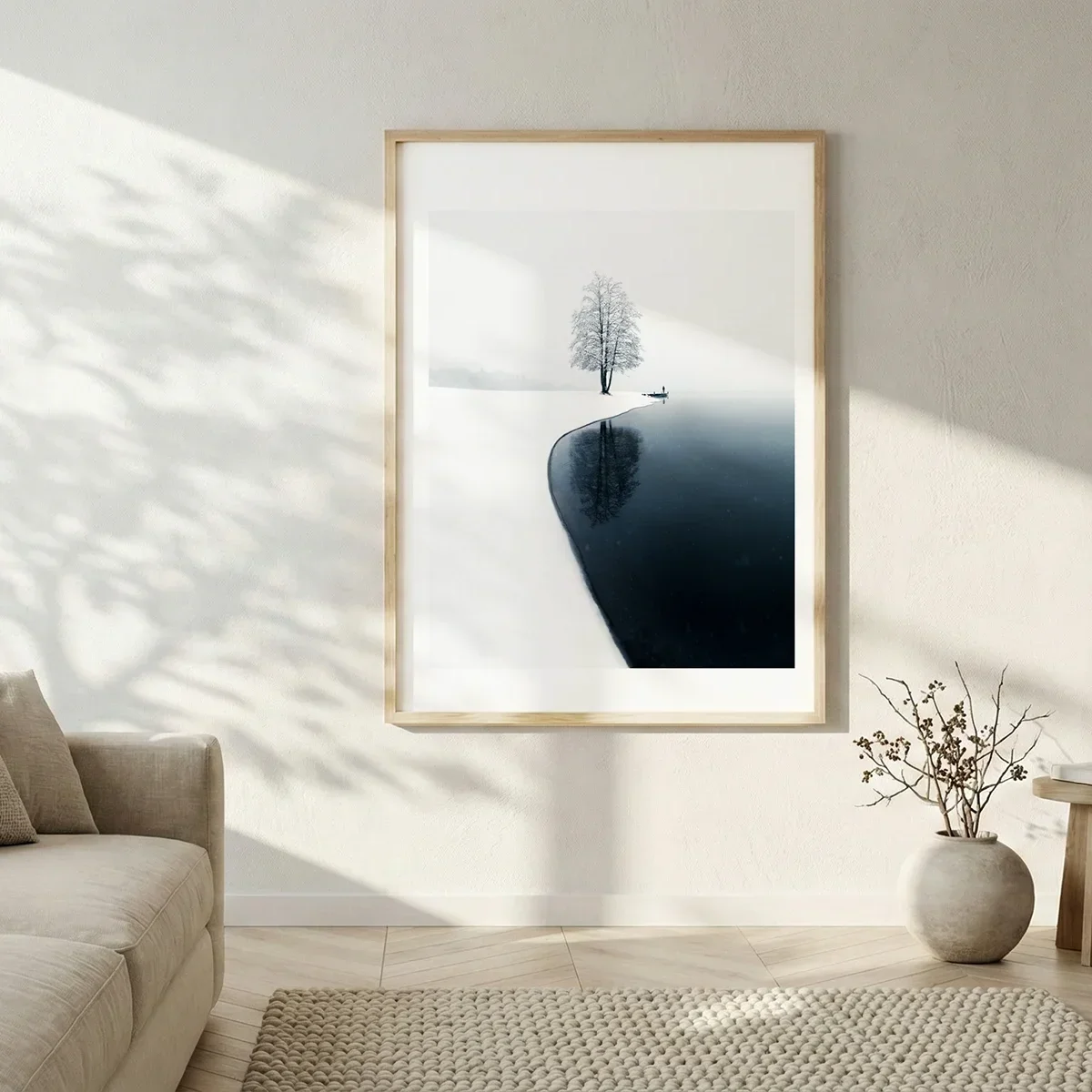 Framed minimalist landscape print within a domestic interior