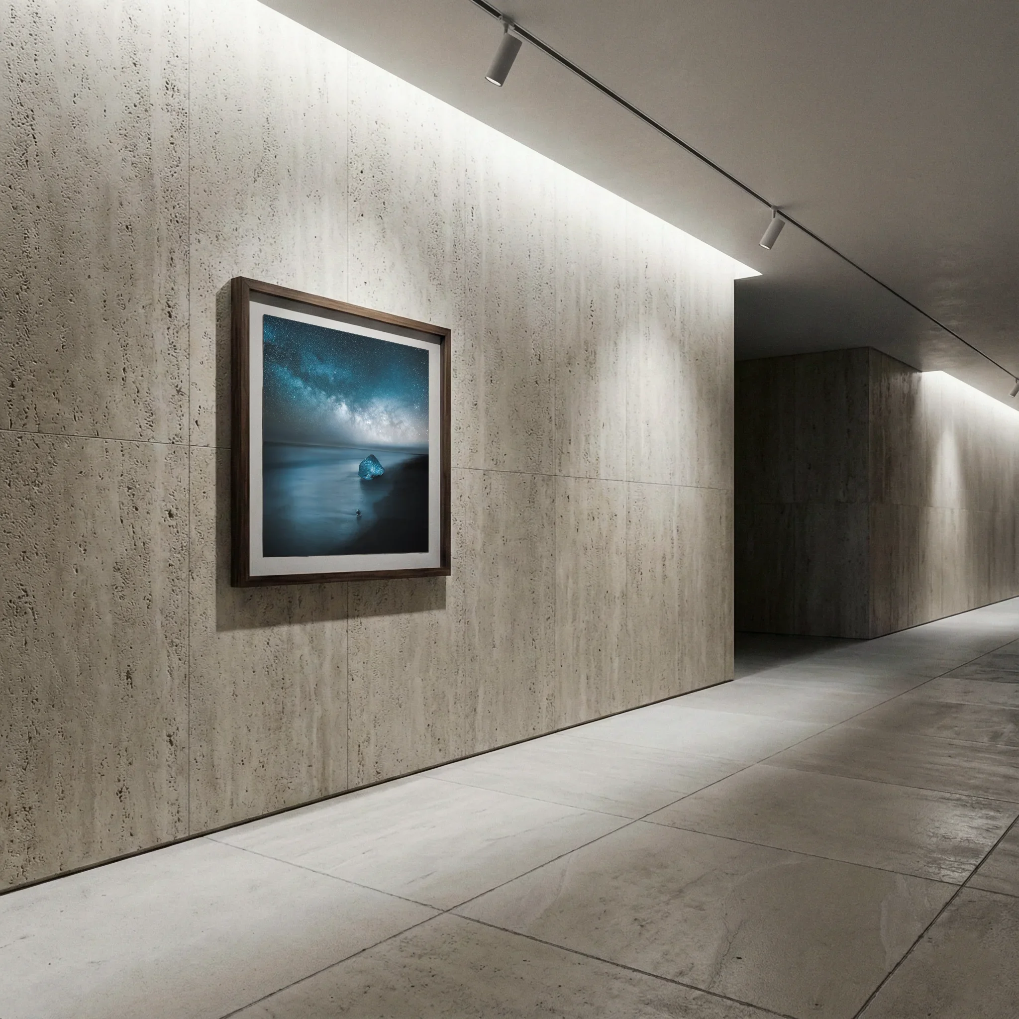 Framed dark landscape photograph as the visual centre of an interior wall